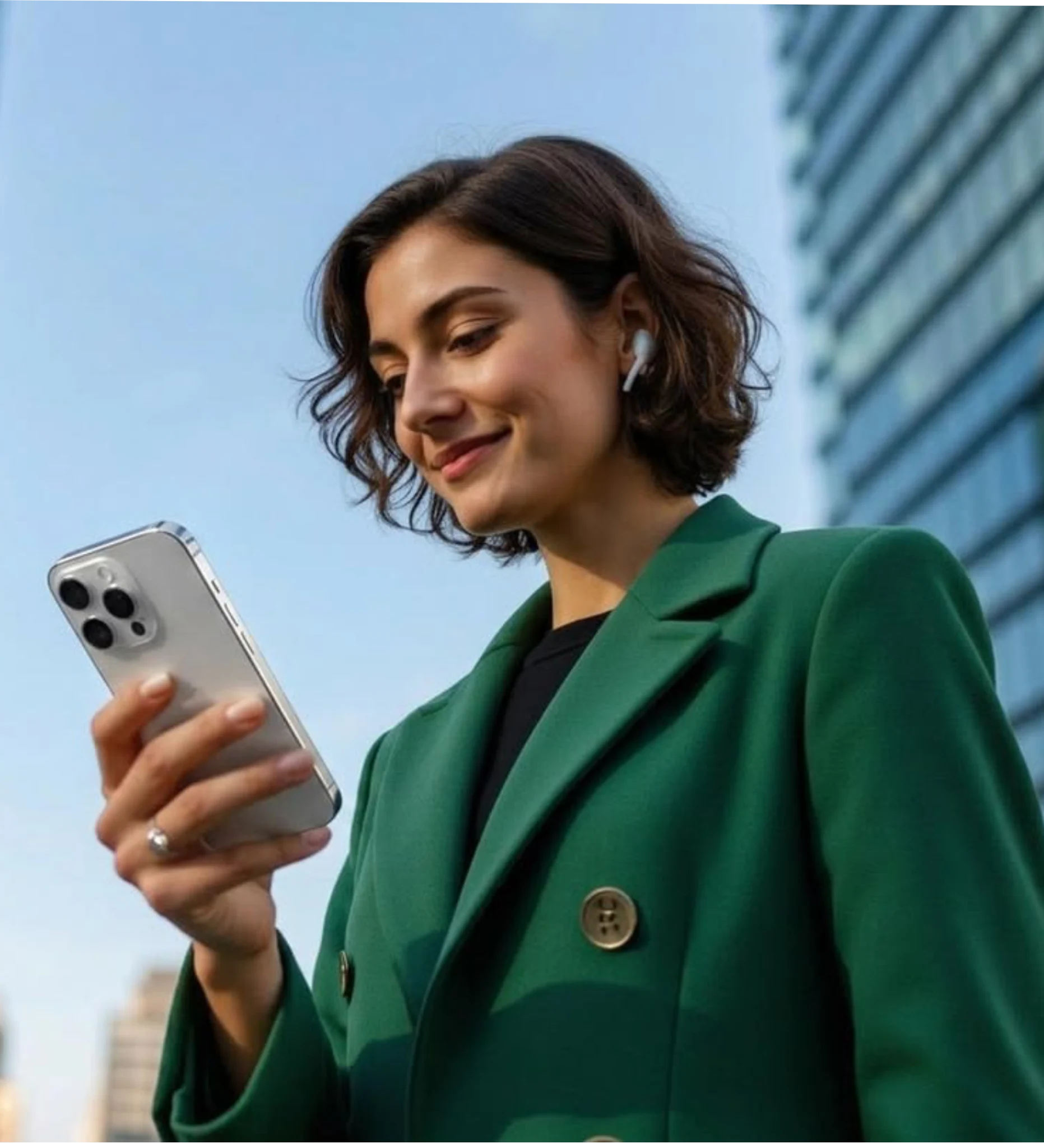 Diaspora buyer reviewing a designer portfolio on her phone.